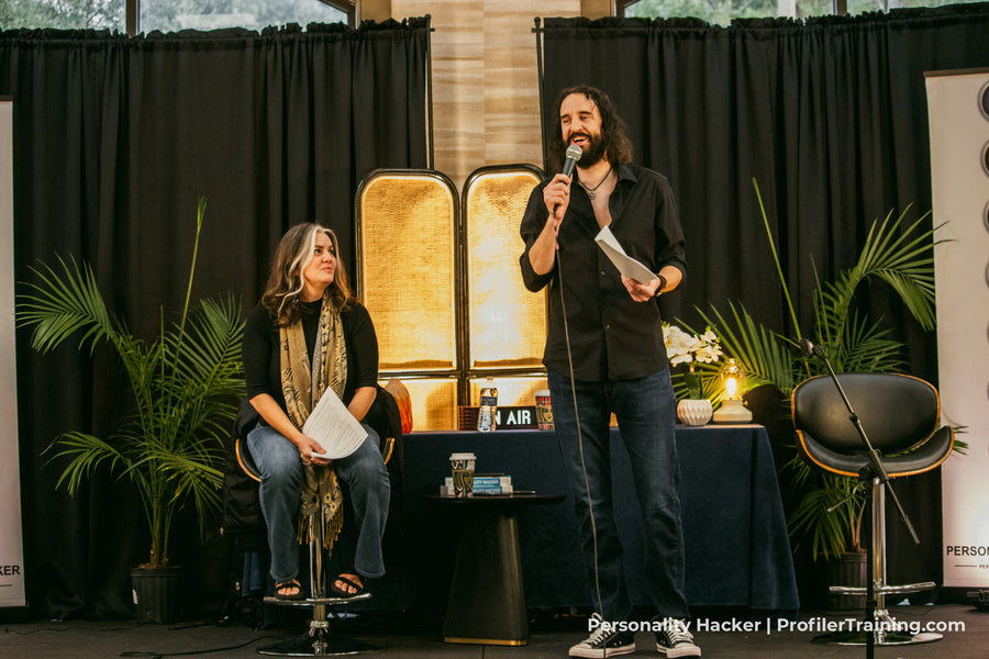 Joel and Antonia coaching a couple on stage